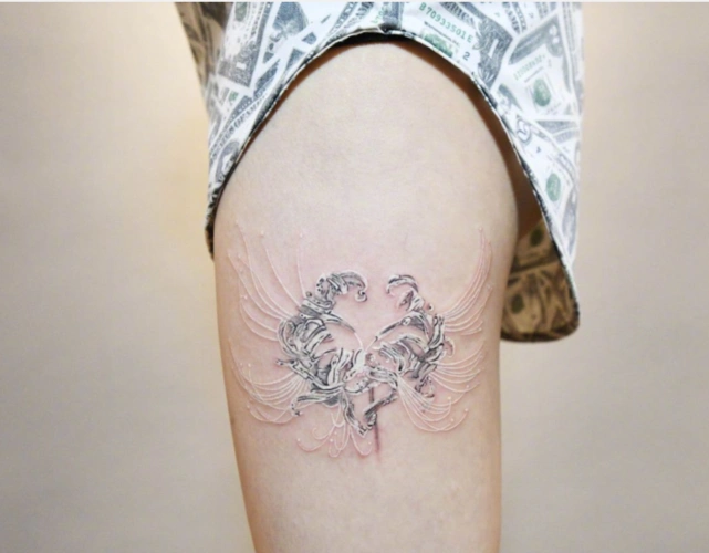 个性女生腿部白色彼岸花纹身图案欣赏对逝去亲人的思念与祝福4