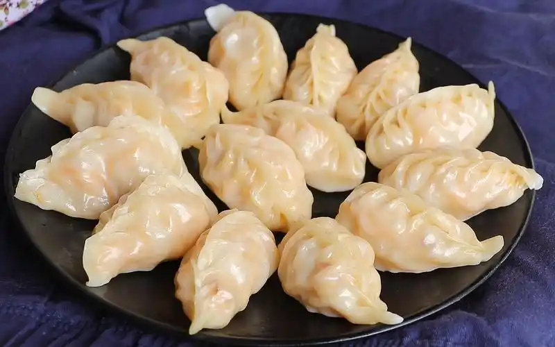 「老南瓜蒸饺」第一次做老南瓜馅的,买的饺子皮,没想到真好吃