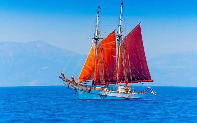 唯美夕阳下的帆船素材电脑桌面壁纸图片