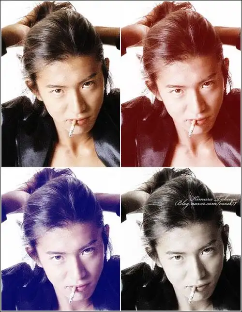 求木村拓哉一张扎头发的照片,衣服貌似是蓝色的,没刘海的