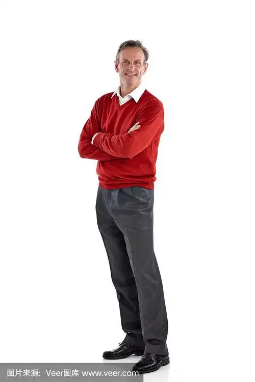 英俊成熟的男人在白色摆姿势