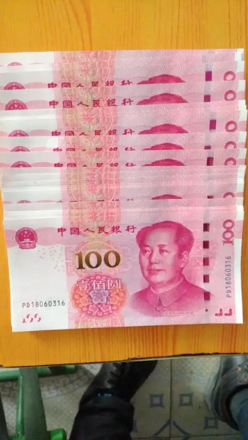 为什么新人民币紫色竖直虚线差这么多?