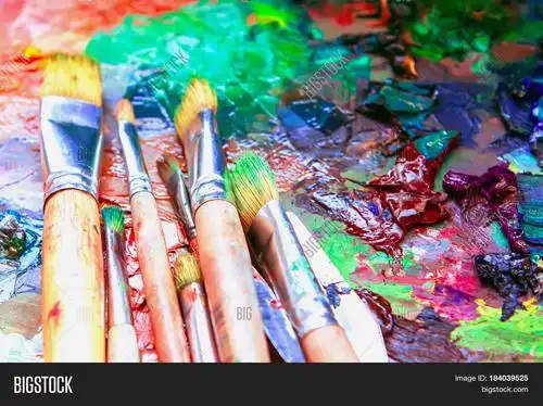 artist brush and palette with paints oil painting impressionism
