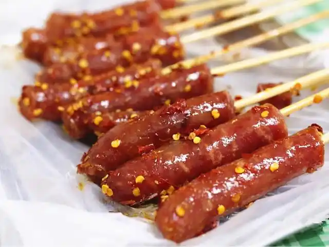 长沙东瓜山这对夫妻,二十年来一个小摊,一根肉肠带火了整条街