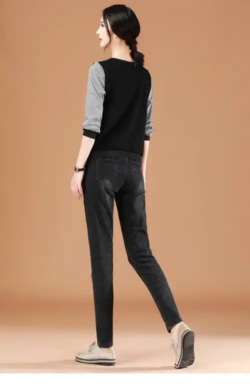 韩潮袭人黑色破洞牛仔裤女修身显瘦2020春季新款松紧腰小脚哈伦裤