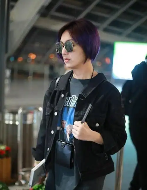 杨千嬅梳短发亮相潮酷有型老公丁子高低调随行护驾爱妻