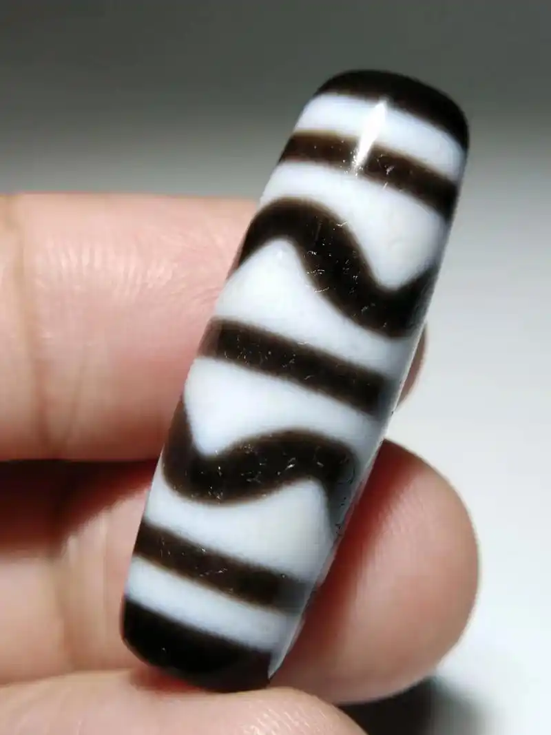 喜欢的聊 #只做高品质 高油润藏传至纯双虎牙天珠,通体白化白 - 抖音