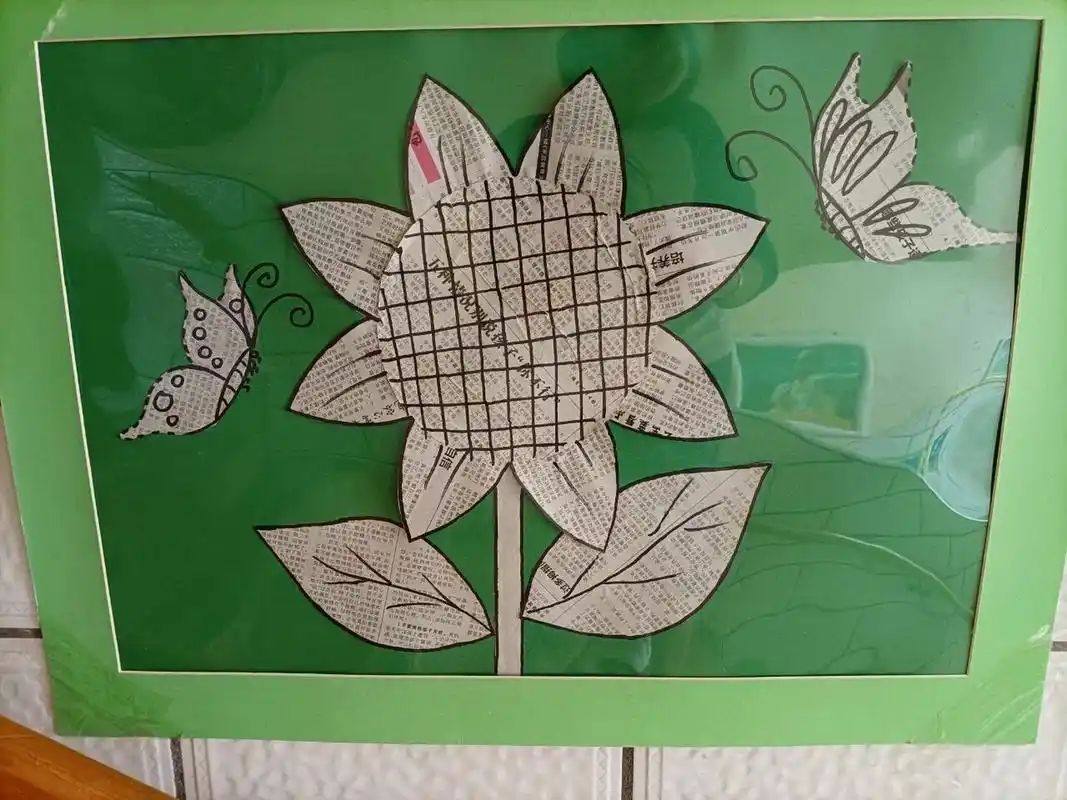 废旧物品手工制作:报纸粘贴画 小小报纸,创意十足,给你不一祥的视觉