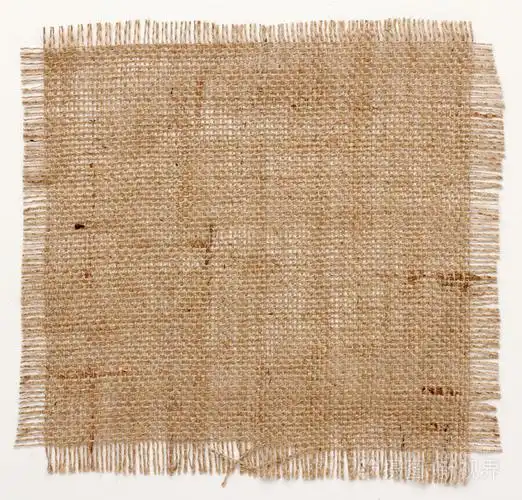 质地的麻布粗麻布平方米与边缘磨损