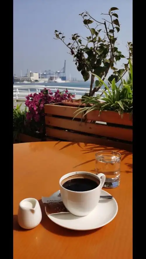 海边晒晒太阳喝喝咖啡惬意,享受阳光909897