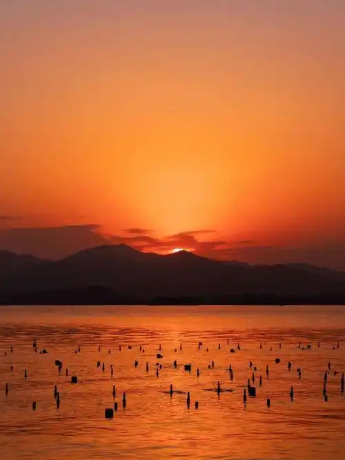 落日余晖映晚霞,镇江傍晚美如画_夕阳_cdw_紫红色