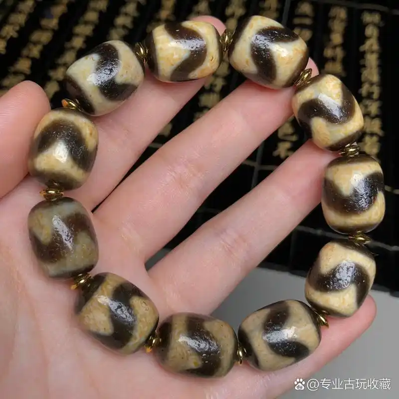 藏区回流老料虎牙天珠手链 尺寸:17*13毫米*11颗