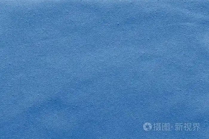 带纹理的背景的牛仔布面料淡蓝色
