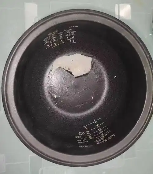 进口电饭煲内胆涂层起皮掉漆怎么办还能继续使用吗