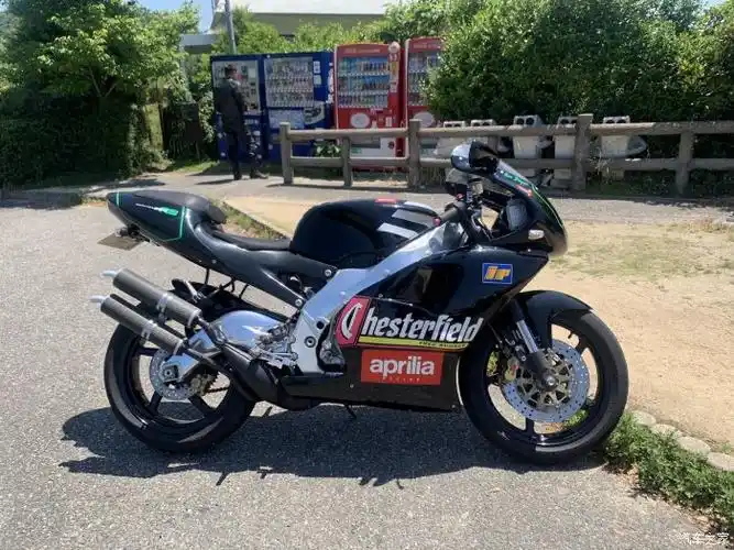 《人潮汹涌》里.刘德华沪a摩托车是什么本田车?