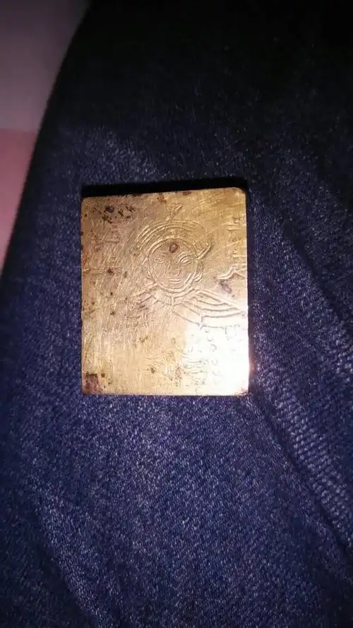 我有一块光绪五年金砖,不知道是不是金砖.六面的.