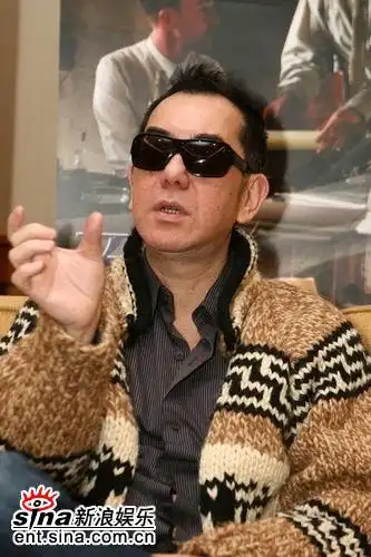 组图面纱上海记者会黄秋生墨镜酷味十足