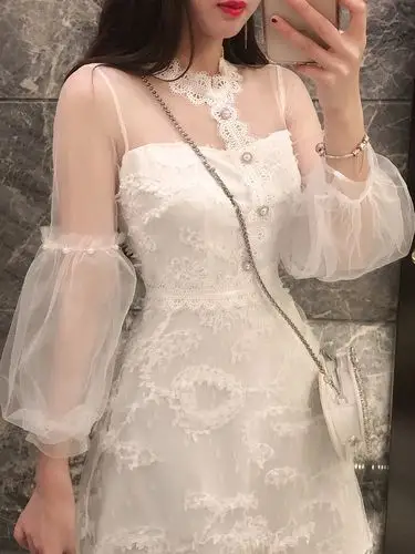 性感透视网纱拼接蕾丝仙女裙春2020新款钩花镂空灯笼袖修身连衣裙