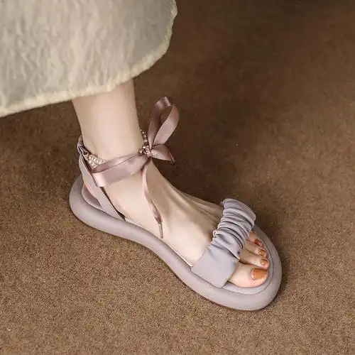 巨好看~绑带凉鞋女新款夏季厚底露脚趾罗马平底珍珠蝴蝶结仙女鞋