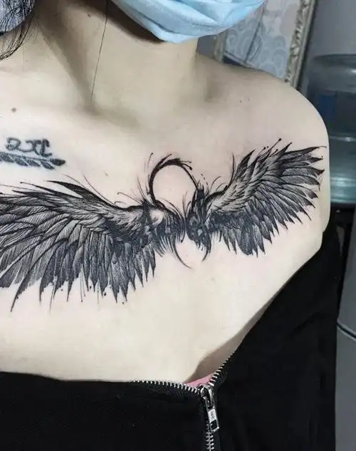 翅膀(遮盖)纹身图片_胸部水墨纹身图案