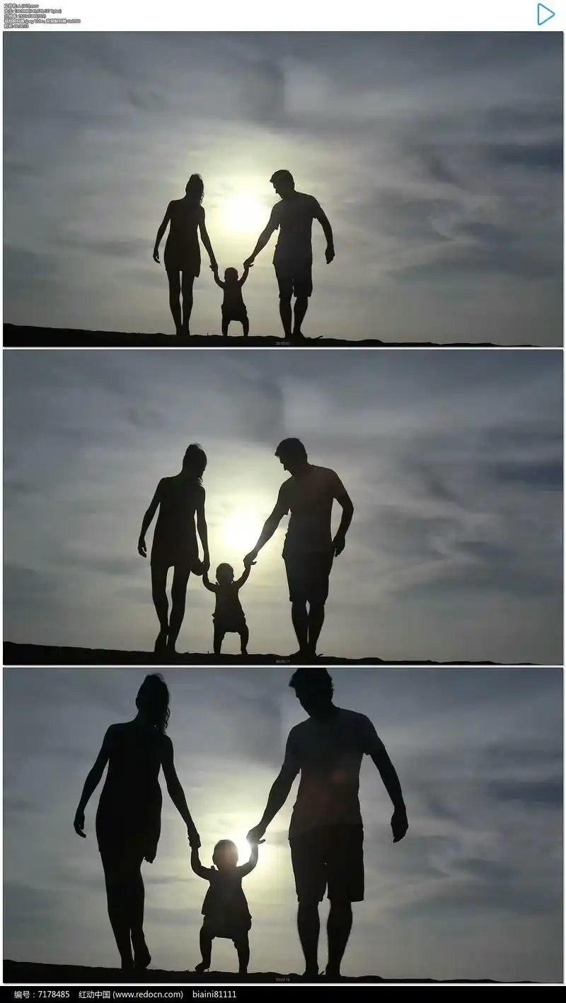 夕阳一家三口手牵手剪影实拍视频素材