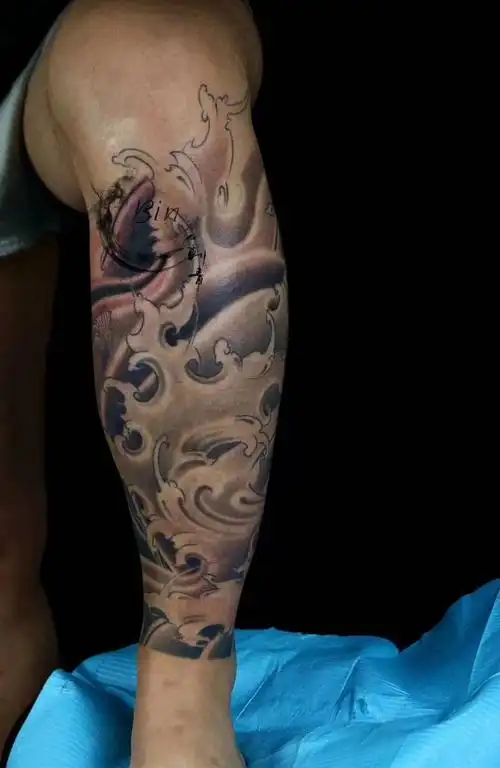 包小腿波浪纹身图片腿部新传统纹身图案