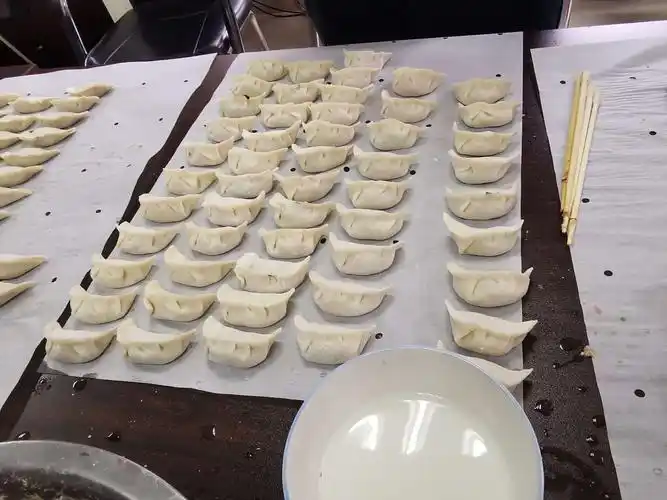 杭州分公司"包饺子连情谊,庆祝三八妇女节"活动