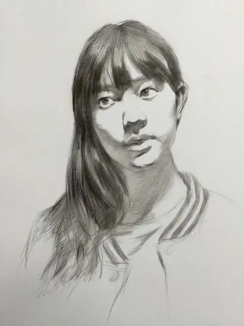 五官清秀 漂亮的长发女孩素描头像画法步骤