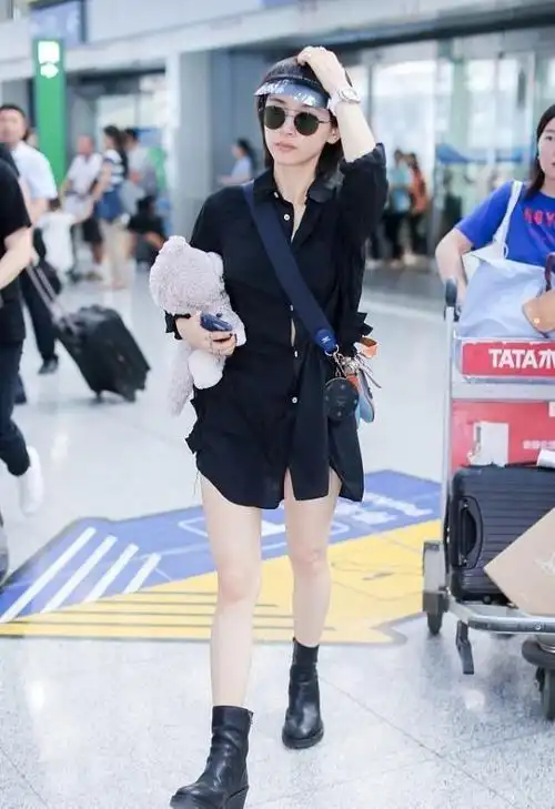 王子文穿衬衫的眼光真好,配短裤长靴显身材,娇俏少女感还挺足的