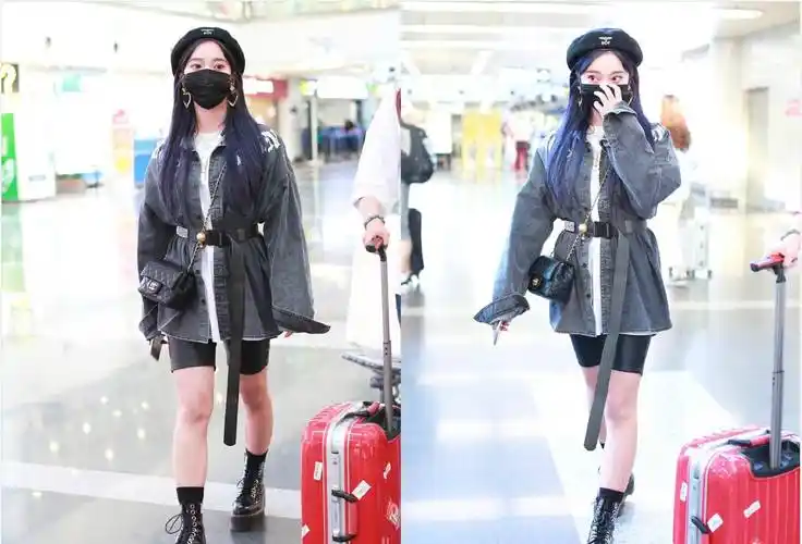 原创张紫宁高调现身穿黑色骑行裤配马丁靴香肠腿成功抢镜