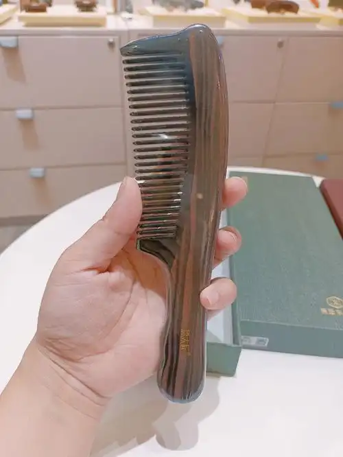 谭木匠黑檀牛角梳