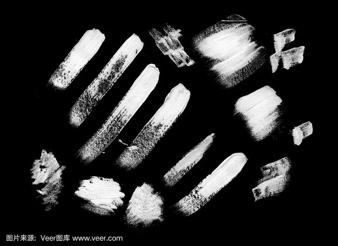 黑色背景上的白色水粉和丙烯酸颜料.