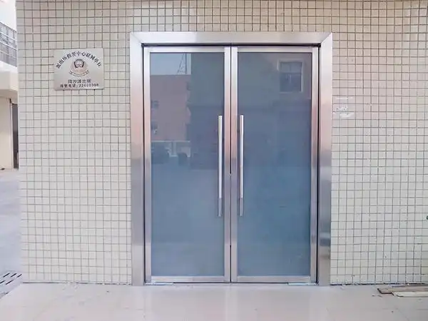 不锈钢玻璃地弹门