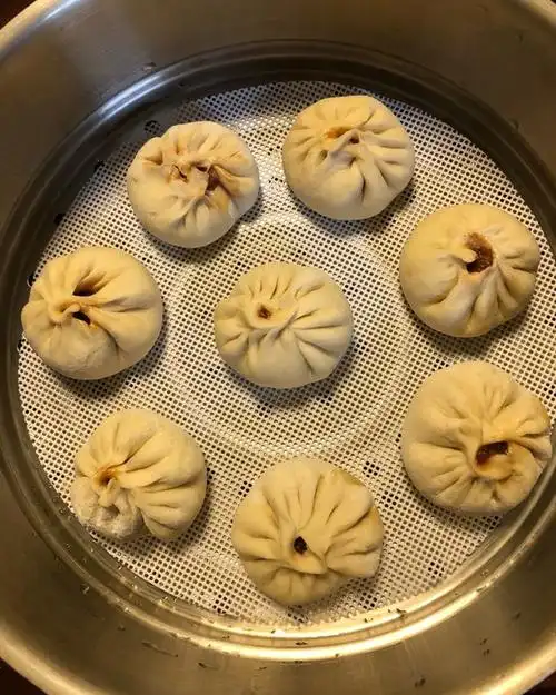加油妮妮做的鲜美多汁的洋葱牛肉包子