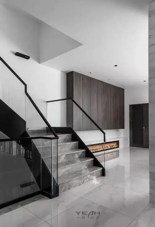 用材配色上我们遵循现代风格的设计思路  整个空间 以黑白灰色为基调