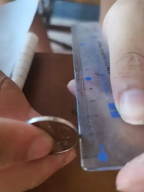 这是我在量硬币的高,高为1mm.