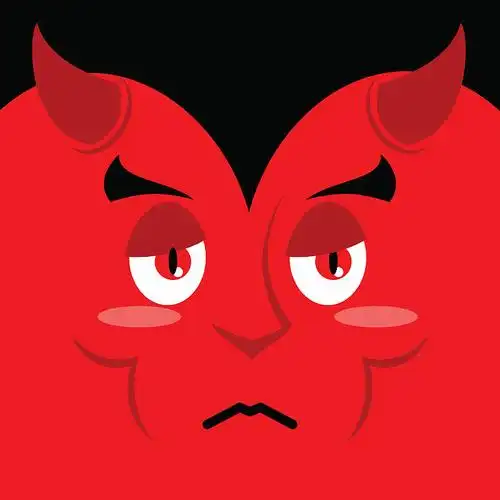 红色背景上的悲伤情绪.恶魔的悲观主义者.年代图片下载