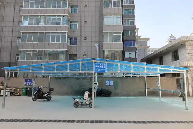 广电小区电动自行车停放充电车棚启用