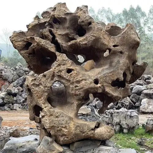 太湖石公园园林景观假山石别墅庭院鱼塘湖边自然造景石驳岸灵璧石图片