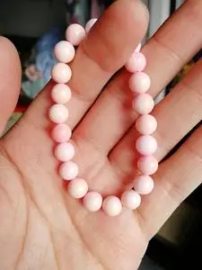 桃花粉成品手串女王贝手串,贝壳类卡8毫米,淡淡的粉色,保证天