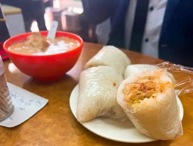 长的像粽子的米团为什么叫糍饭