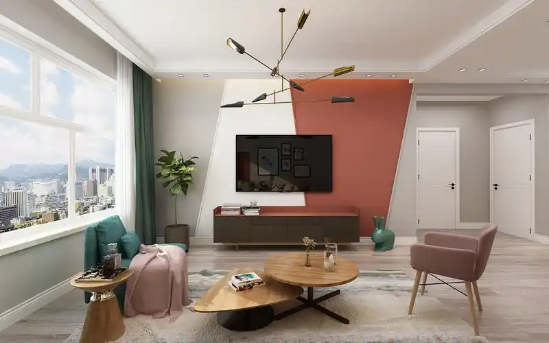 客厅宽敞明亮,墙面以灰色主体,电视背景墙用三色打造创意造型,沙发