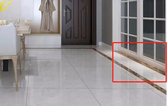 这块"石头"就是过门石,也叫门槛石.