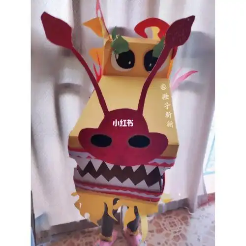 幼儿园纸工龙头手工制作 我做的龙头后孩子们来做龙身 承蒙老师信任让