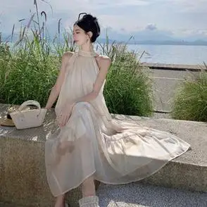 无袖新款仙女裙海边度假长裙子蝴蝶结晕染挂脖连衣裙女装2024夏季