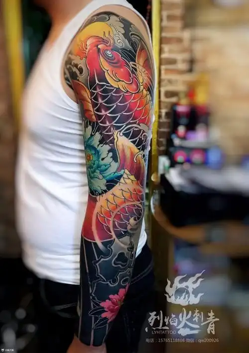 鲤鱼牡丹花臂_鲤鱼手臂纹身图案大全 - 纹身大咖