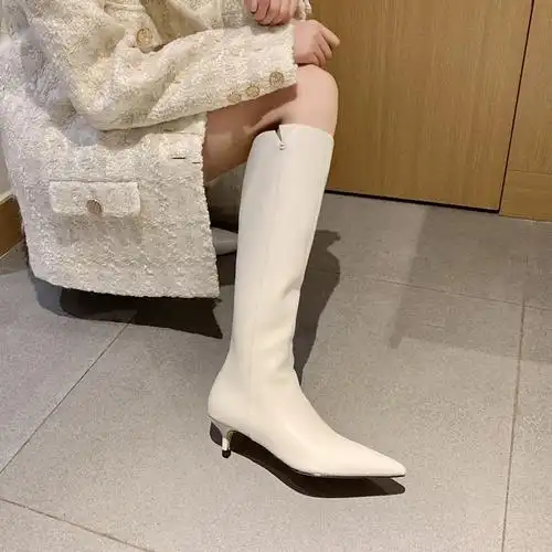 热销尖头细跟长靴真皮_白色靴子女中筒靴尖头不过膝小跟长靴2020新款