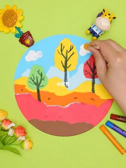 彩色卡纸创作出有趣的撕纸拼贴画,我们一起来做彩色的树吧!