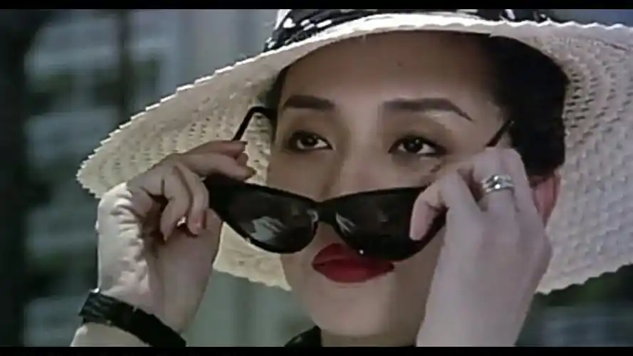 《英雄本色3》.阿杰(梅艳芳饰)