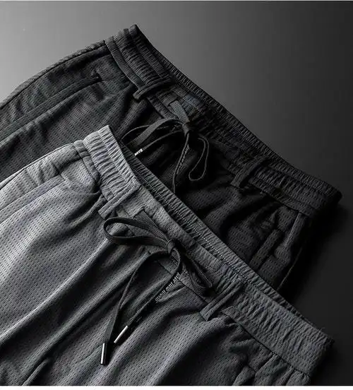 日本夏季薄款冰丝裤子男士休闲裤透气宽松网眼空调男裤超薄速干运